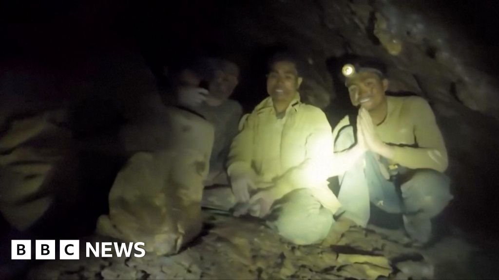 Moment rescuers find five men trapped in Laos cave