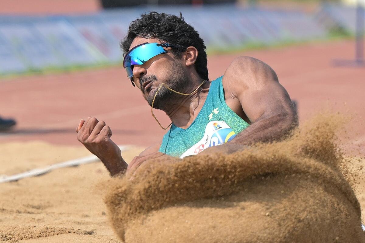 Tejaswin Shankar in action during the long jump decathlon event.
