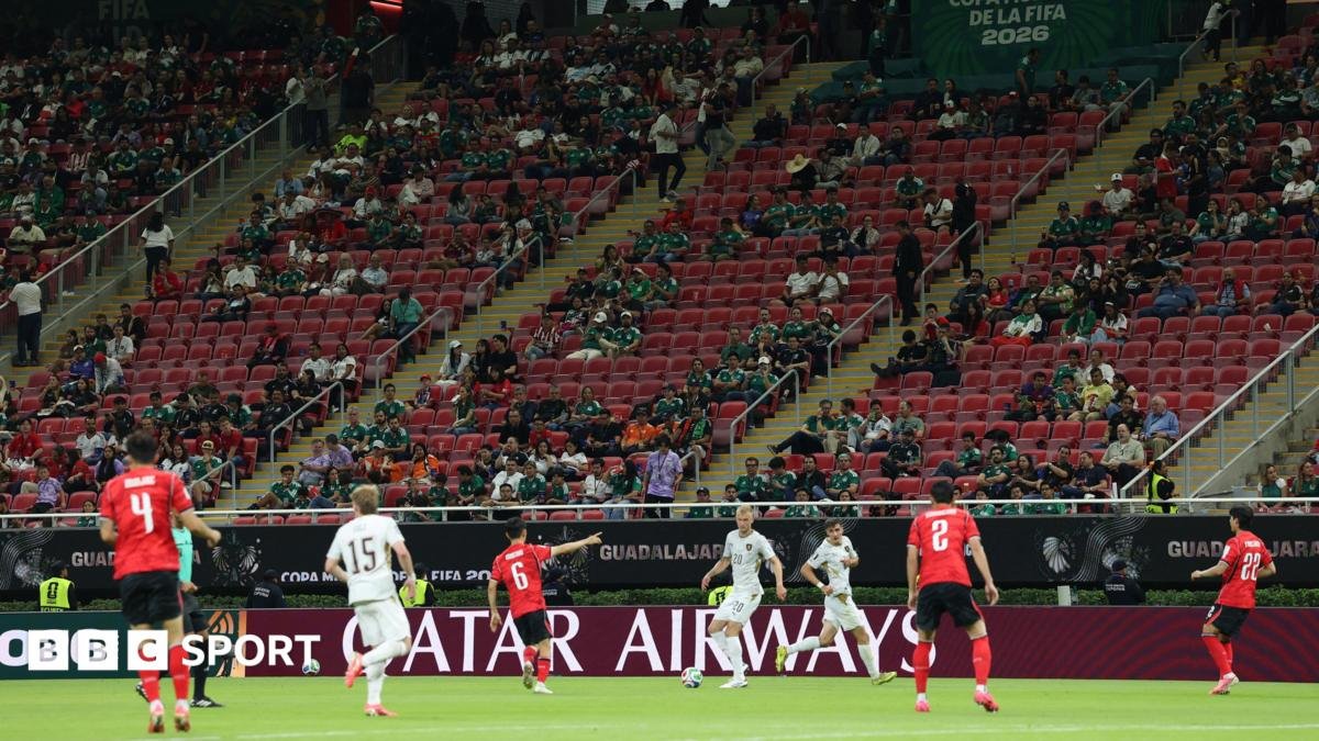 South Korea and Czech Republic play in front of a stand with a number of empty seats