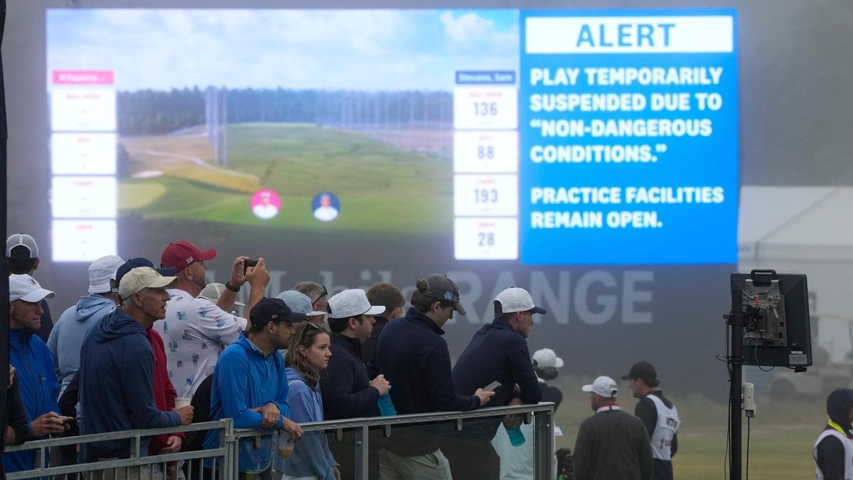 US open suspended early in first round due to inclement weather