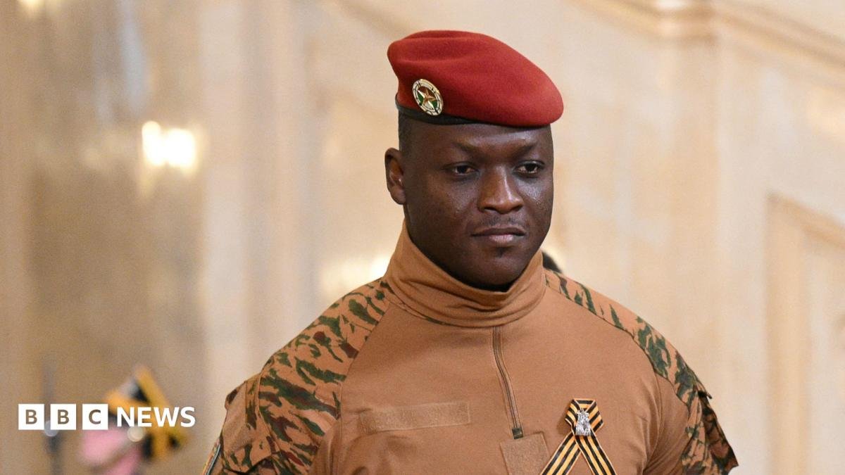 Burkina Faso's military leader Ibrahim Traore wearing a military uniform with a red hat