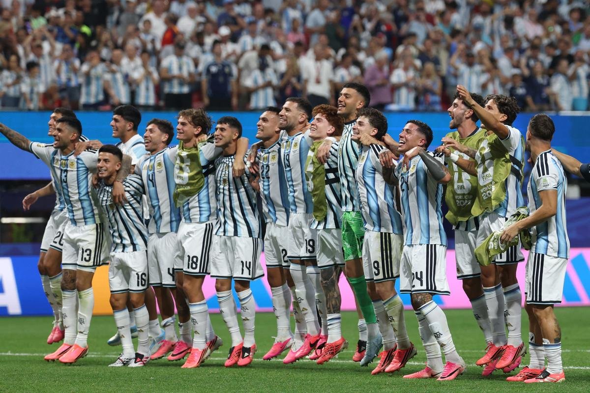 Generation next: Argentina’s players celebrate together, a team no longer content with merely playing alongside Lionel Messi, but one determined to protect and extend his World Cup story.