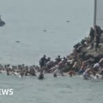 Migrants seen swimming around border fence of Spanish enclave Ceuta | ACTPnews