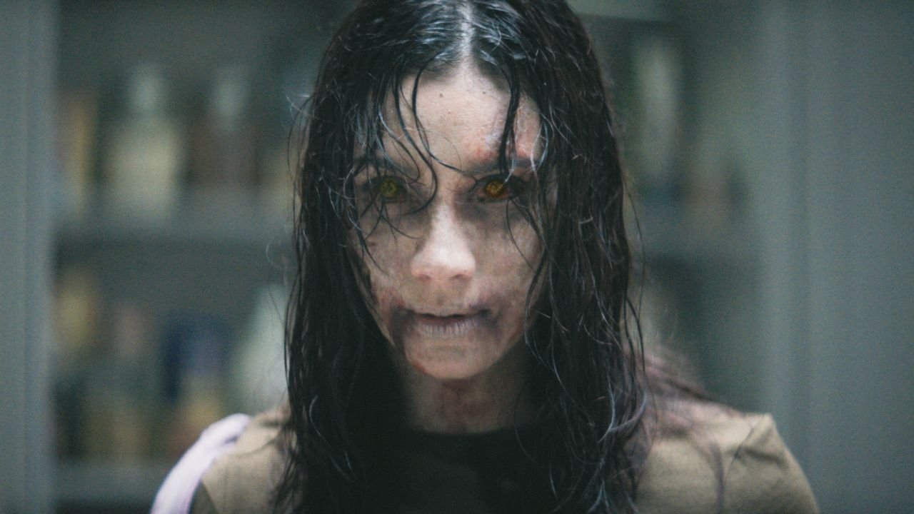 Luciane Buchanan as Thya in New Line Cinema’s 'Evil Dead Burn', a Warner Bros. Pictures release. Photo Credit: Photo Courtesy Warner Bros. Pictures. Copyright: © 2026 Warner Bros. Ent. All Rights Reserved.