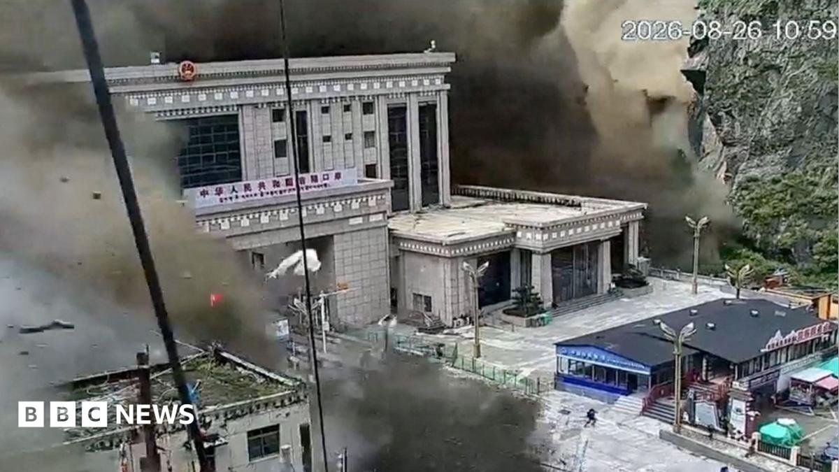 CCTV shows people running as mud and water destroys buildings in Gyirong, Tibet