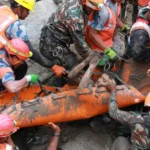 Photos: UN urges global aid after China, Nepal floods kill over 1,300 | Floods News | ACTPnews