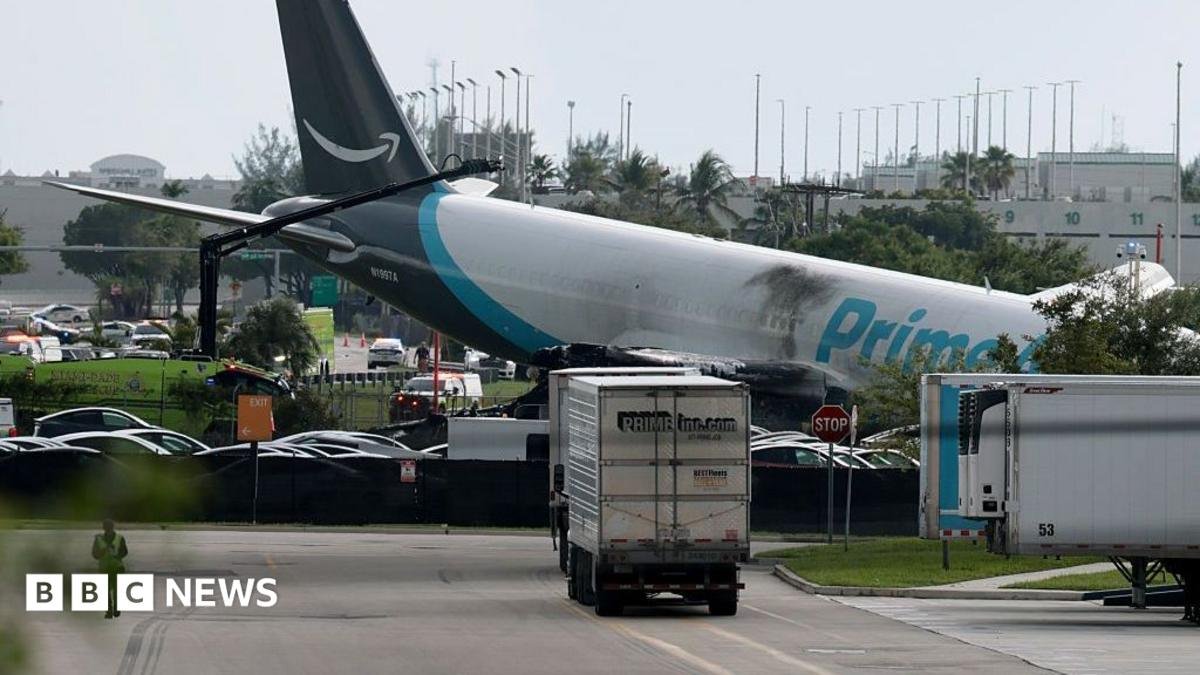 The plane sitting at a crooked angle to the ground