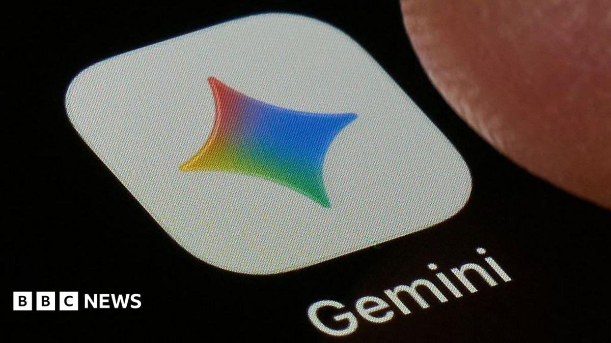 A close-up shot of the Gemini application on a black screen. The icon is a white square with a four-point star in Google's colours, under which the word 'Gemini' is printed.