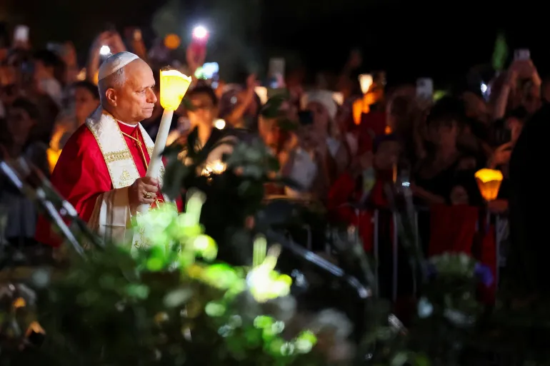 Pope Leo participates in a candlelight procession at the Sanctuary of Our Lady of Lourdes as part of his four-day apostolic journey to France, in Lourdes, France, September 27, 2026 [Stephane Mahe/Reuters]
