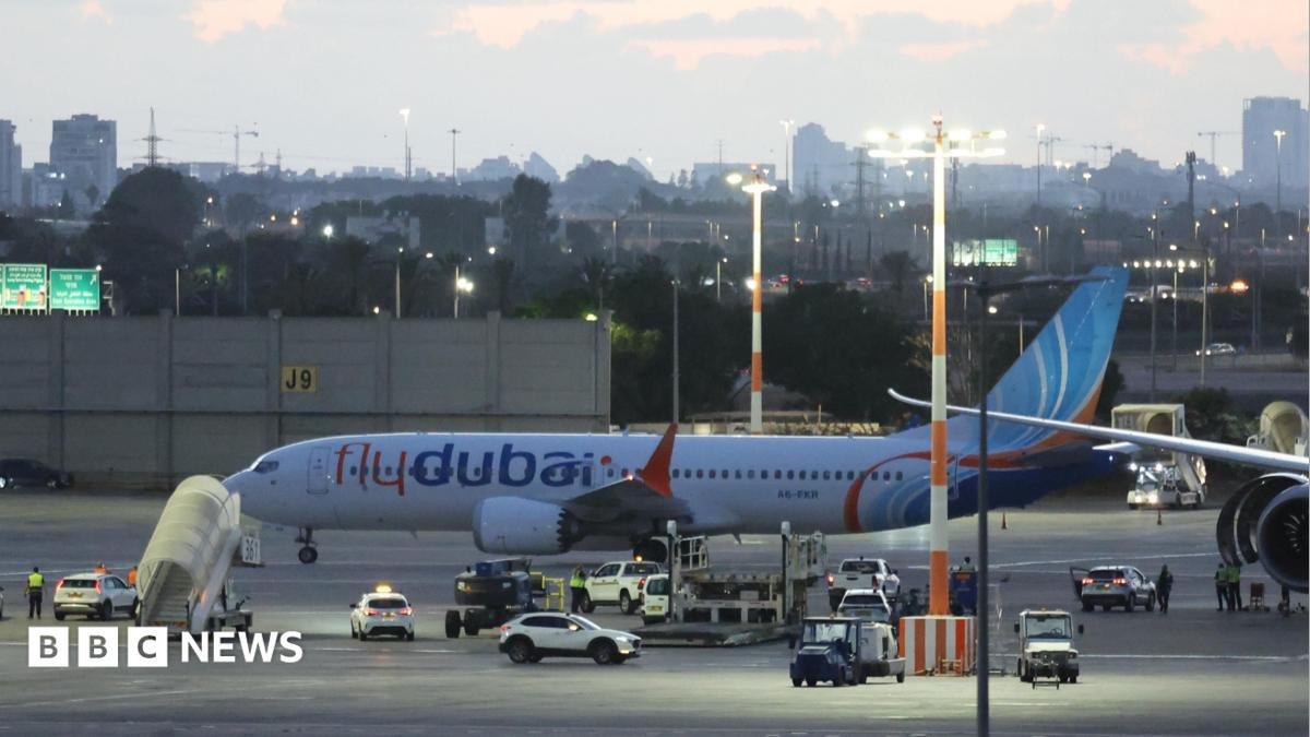 A Flydubai aircraft carrying passengers from Tabuk, Saudi Arabia, stands on the tarmac after landing at Ben Gurion International Airport near Tel Aviv.