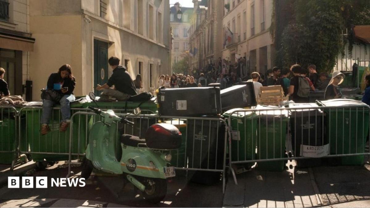 French high school students gather outside the Lycee Sophie Germain high school