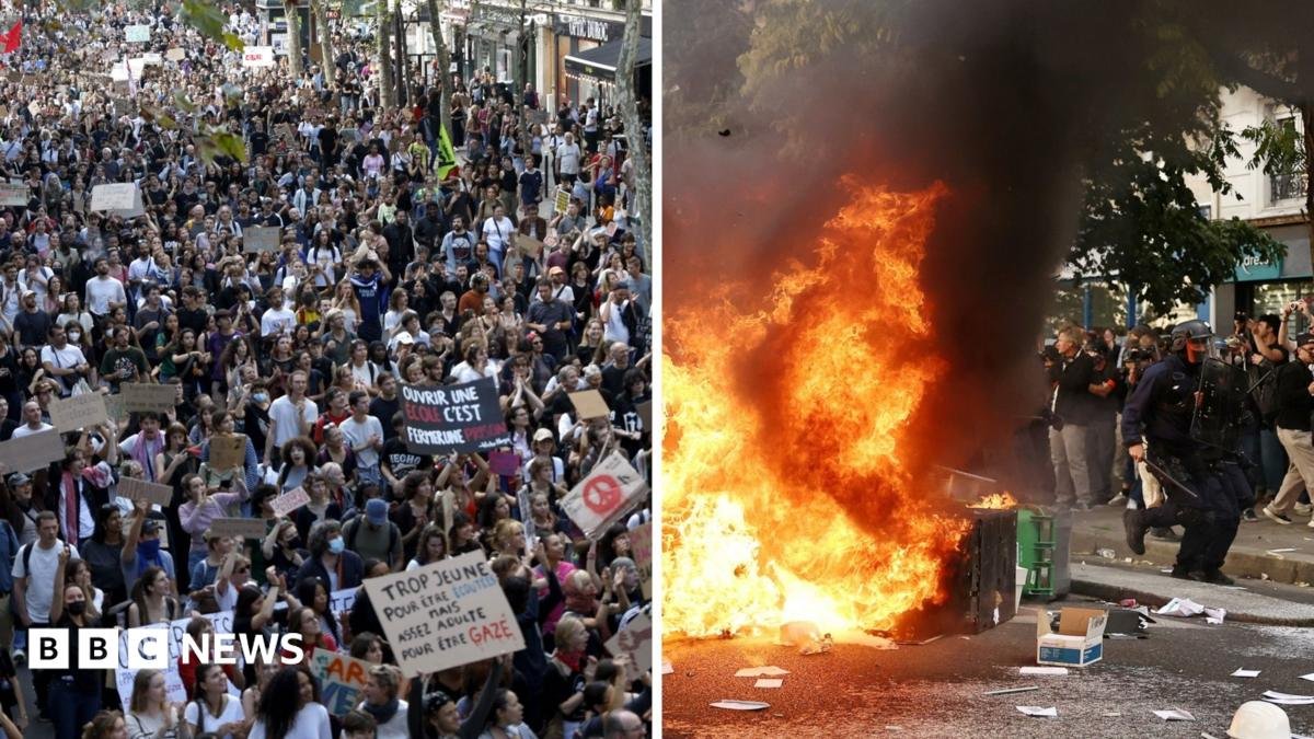 Composite image of peaceful protesters and a bin set on fire in Paris