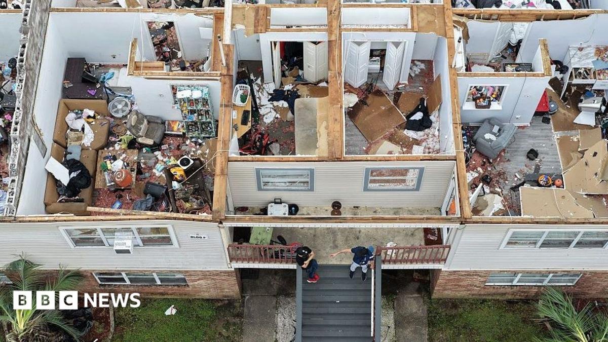 An apartment complex is seen from above, after the roof was blown off in Milton, Florida
